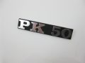 Emblem "PK 50" side panel black/alloy, hole to hole distance: 80mm, 95x17mm Vespa PK