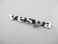 Schriftzug "Vespa" Beinschild schwarz/alu Lochabstand: 60mm 120x18mm Vespa PK, PX alt